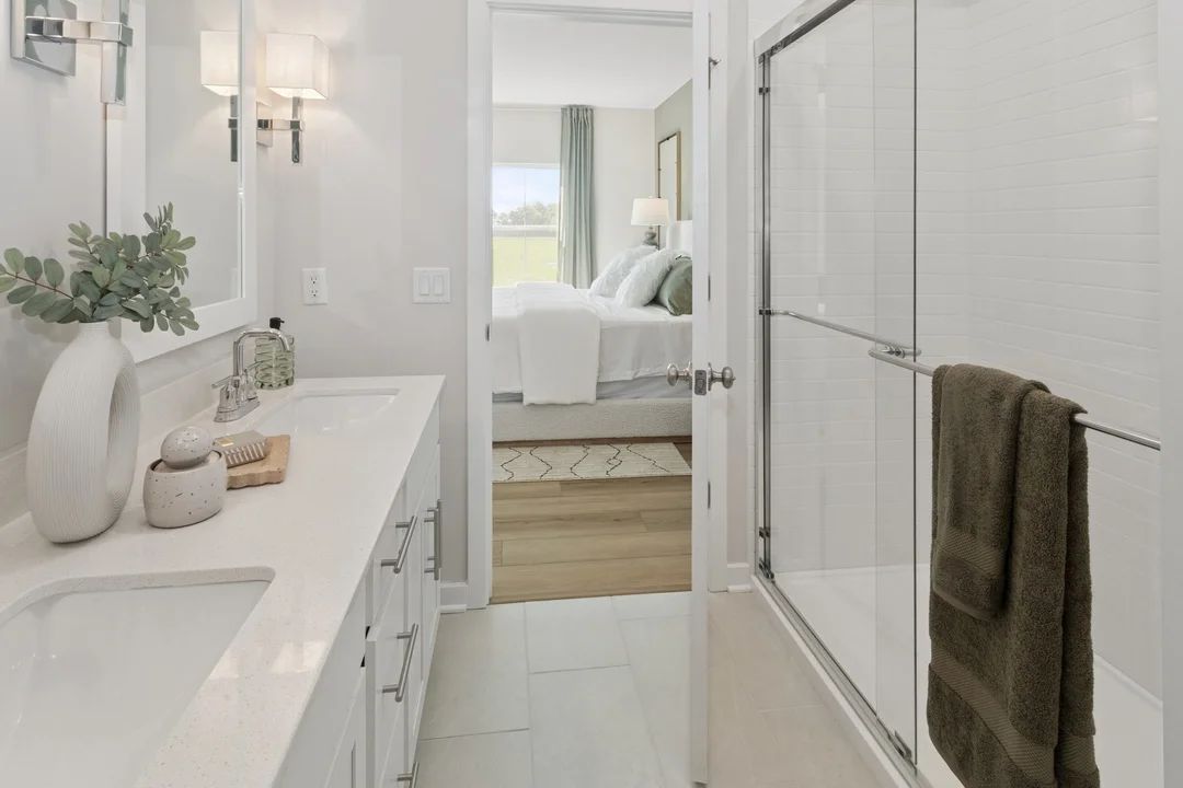 Primary bath with glass shower enclosure