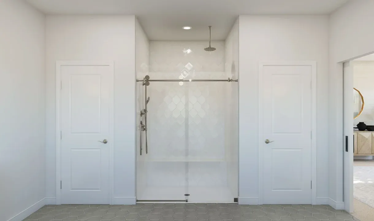 Primary bath with tile and glass shower