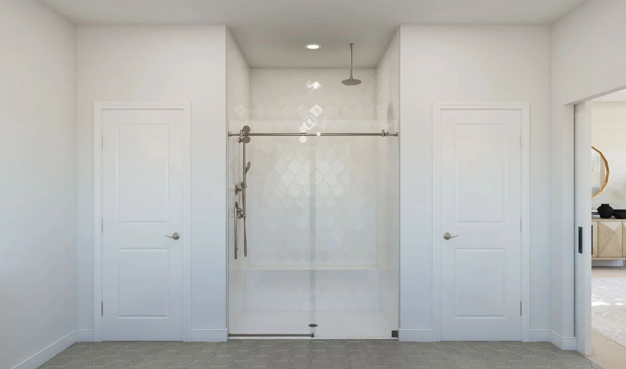 Primary bath with tile and glass shower