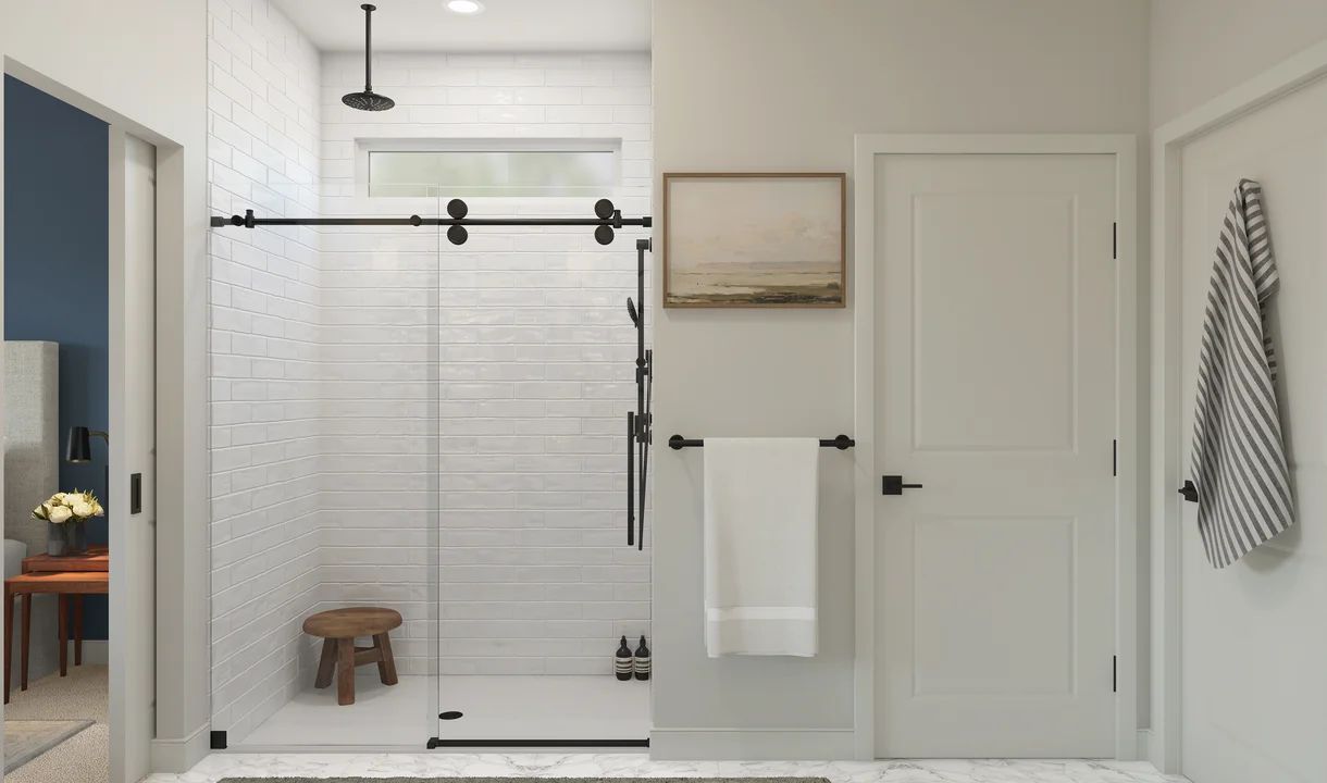 Primary bath with glass shower enclosure