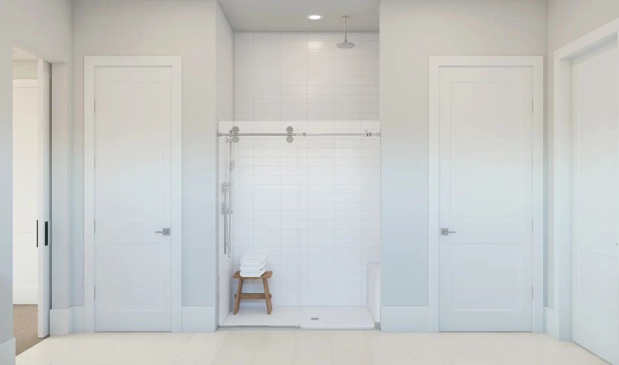 Primary bath with glass shower enclosure