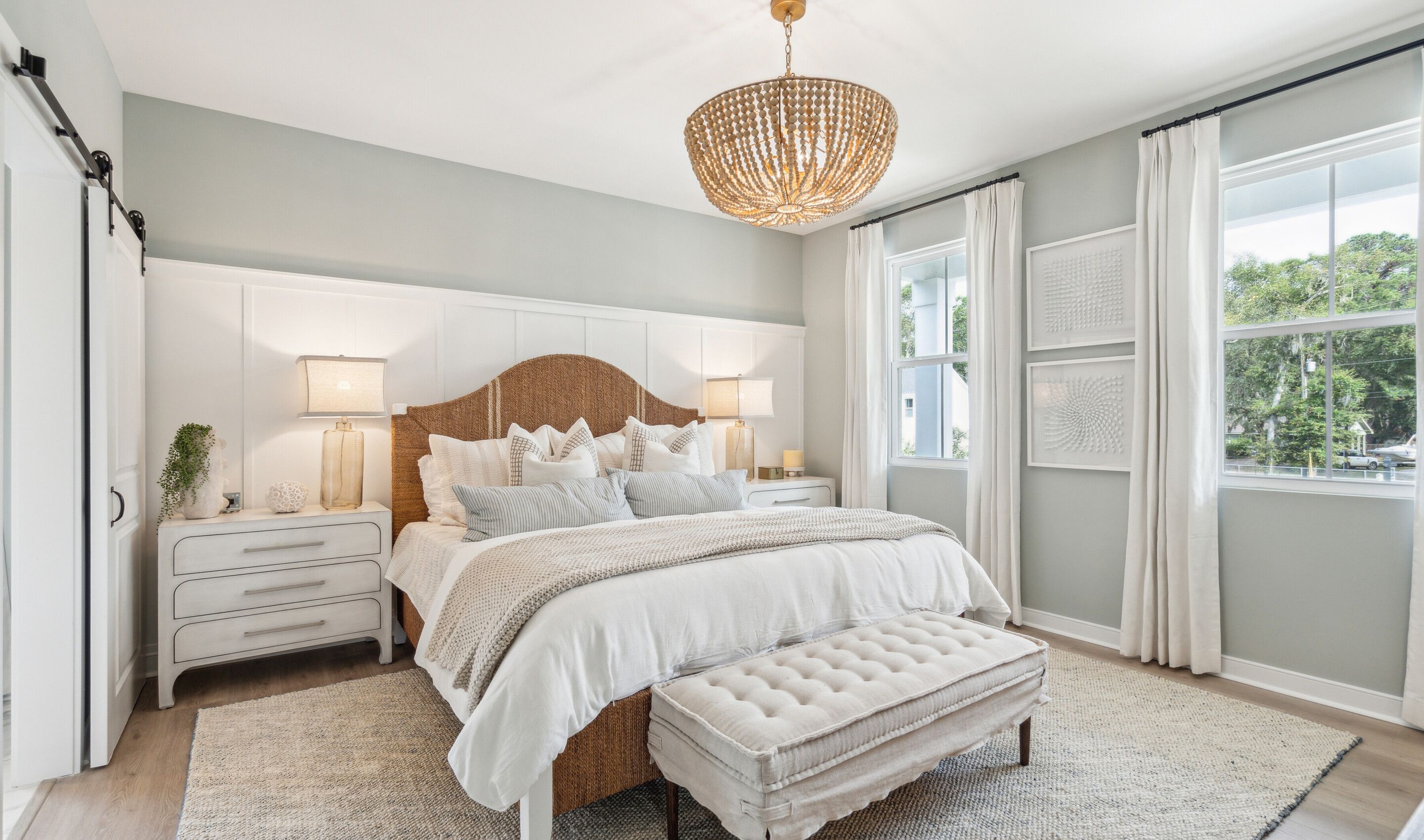 Primary suite with decorative feature wall