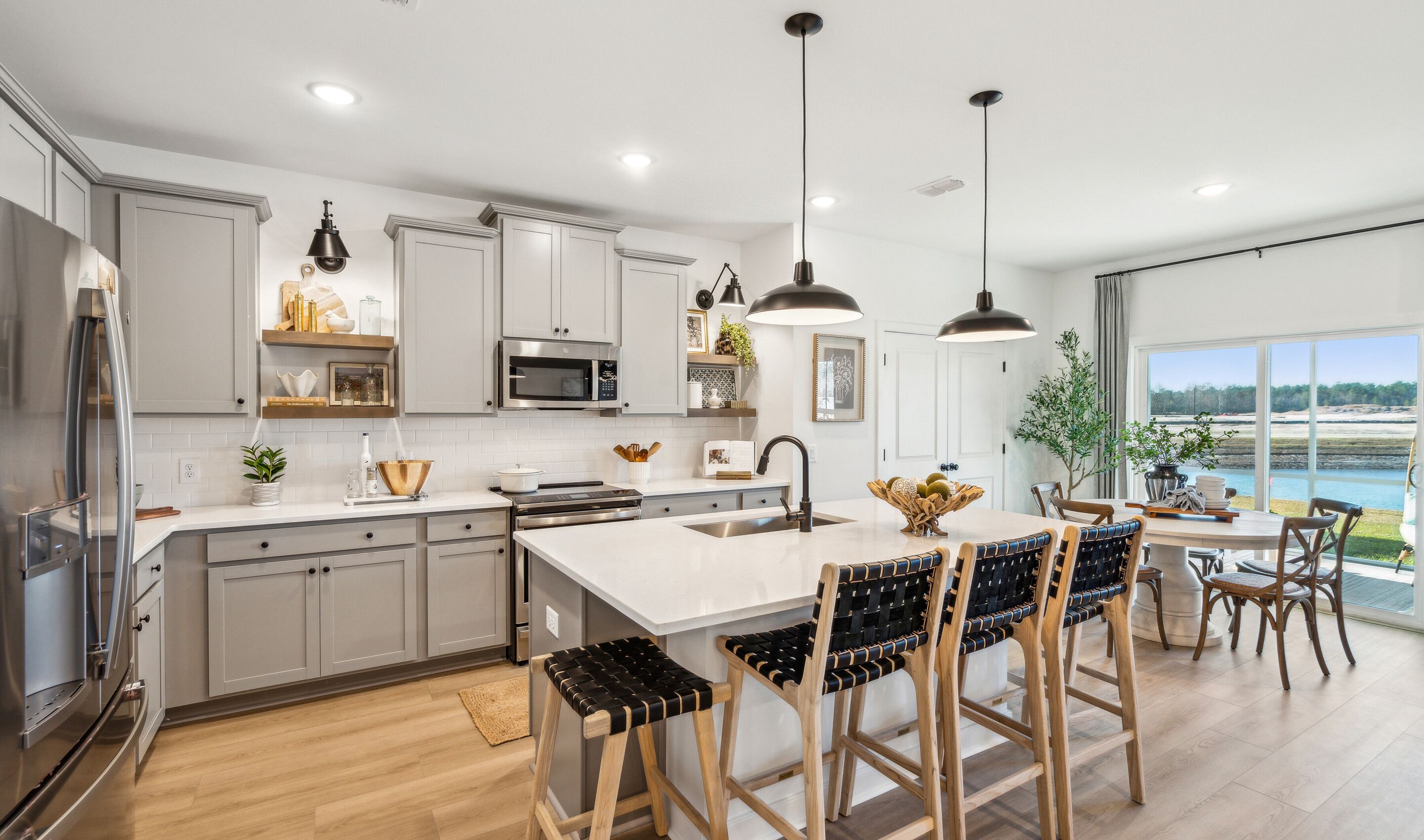 Kitchen with pendant lights over island