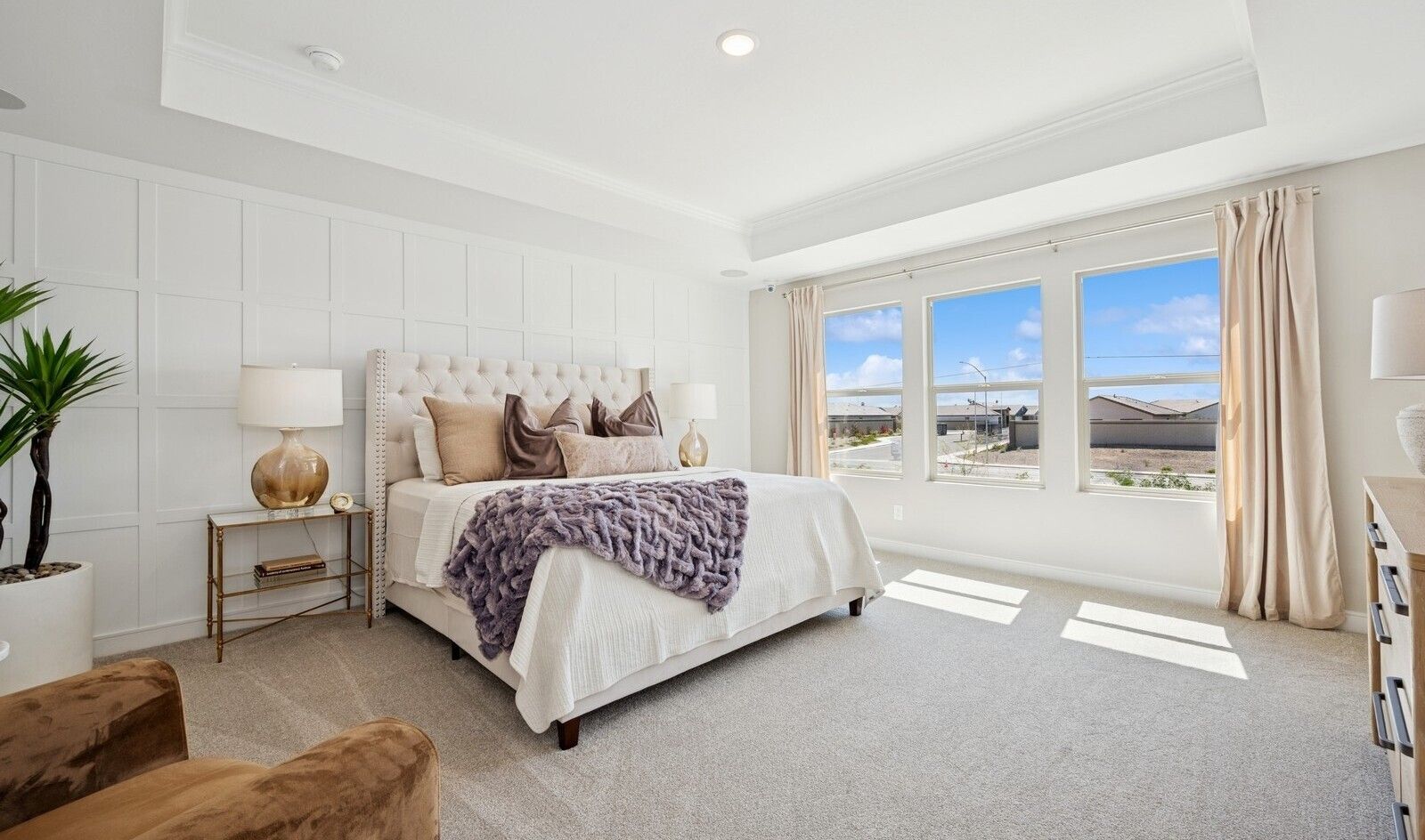 Primary suite with decorative feature wall