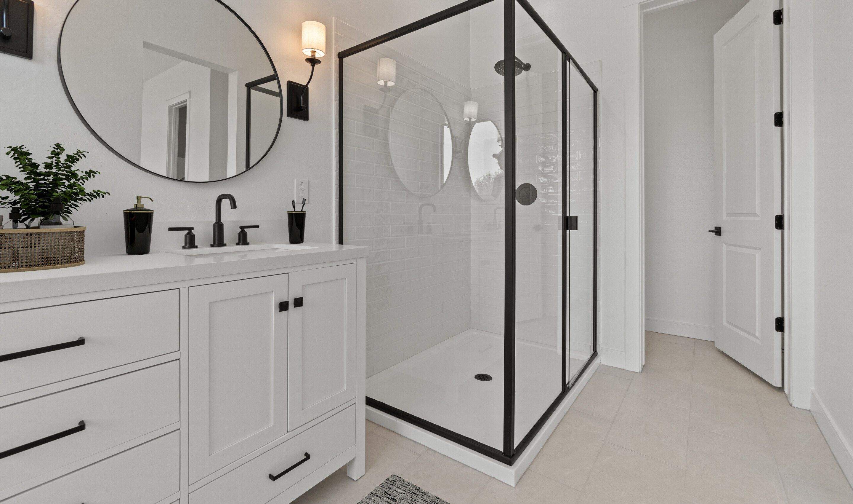 Glass shower enclosure in primary bath