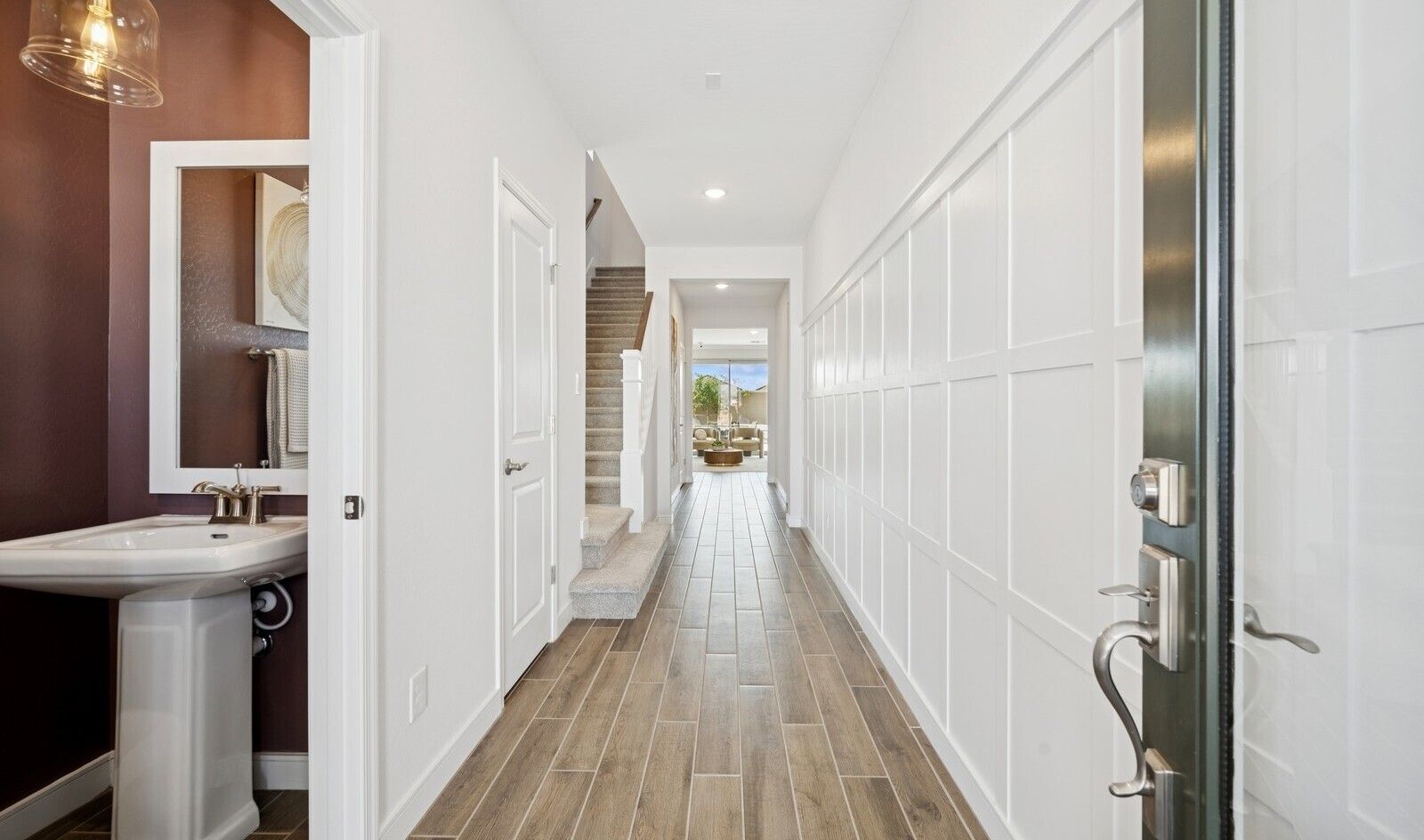 Welcoming foyer with decorative feature wall