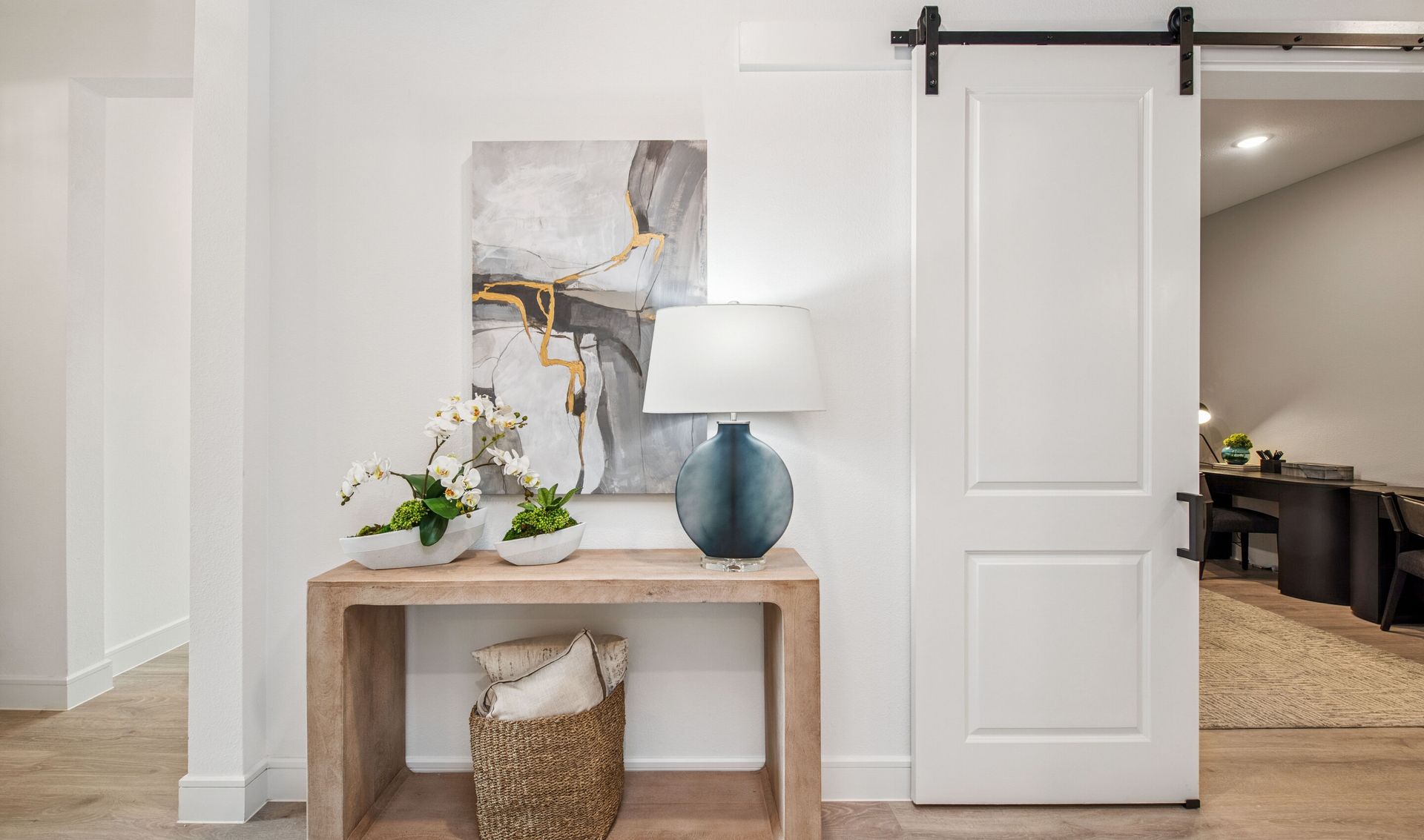 Foyer with sliding barn door to home office