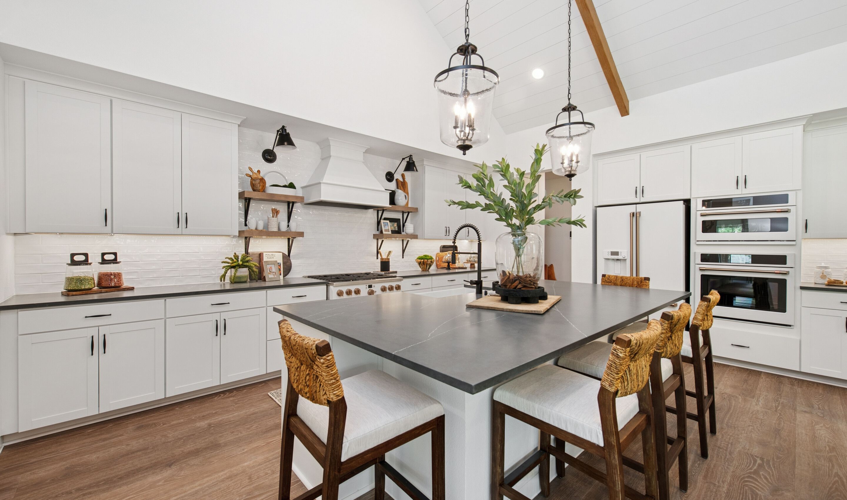 Kitchen with pendant lighting and shiplap ceiling