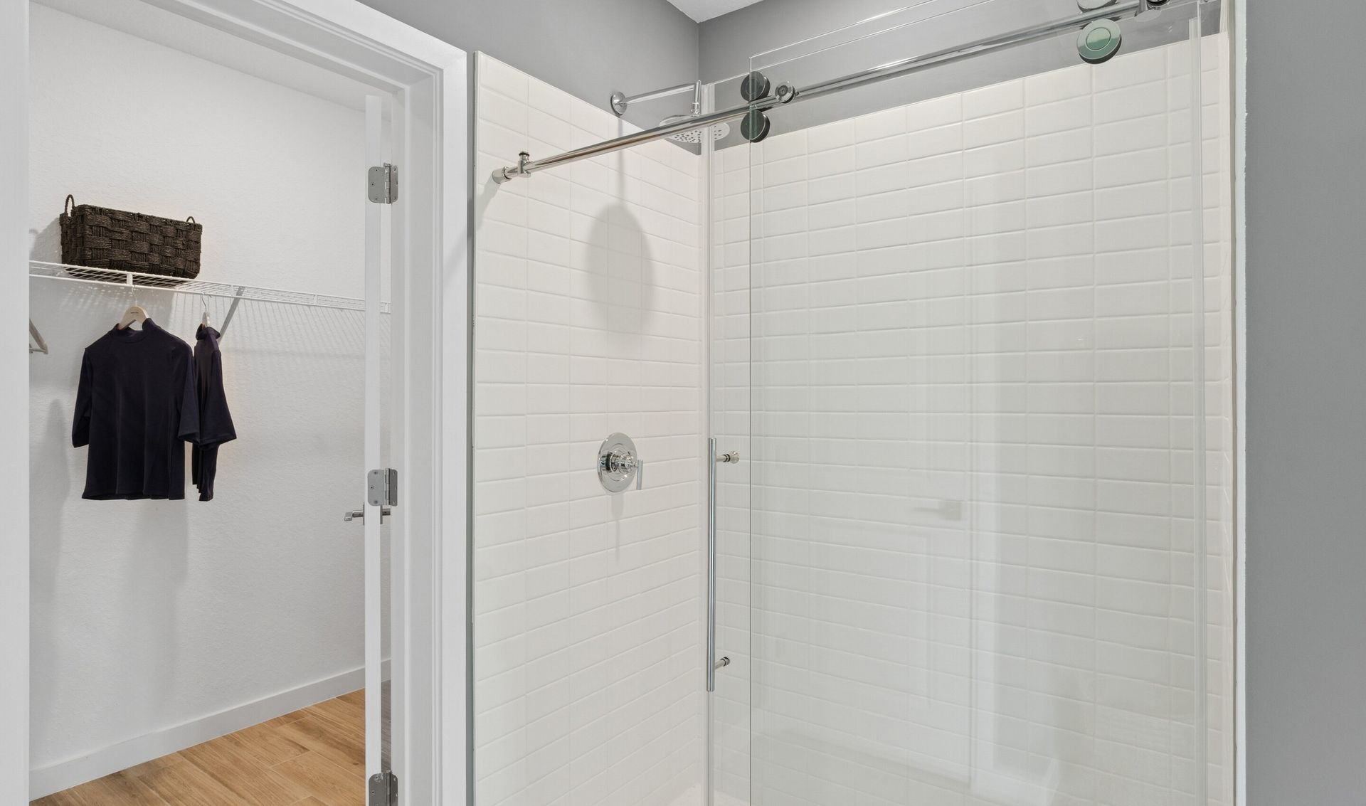 Primary bath with glass shower enclosure
