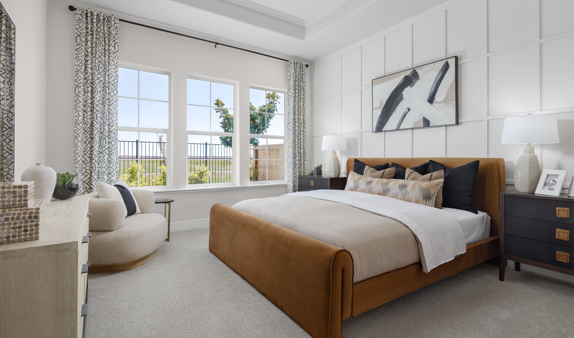 Primary suite with decorative feature wall
