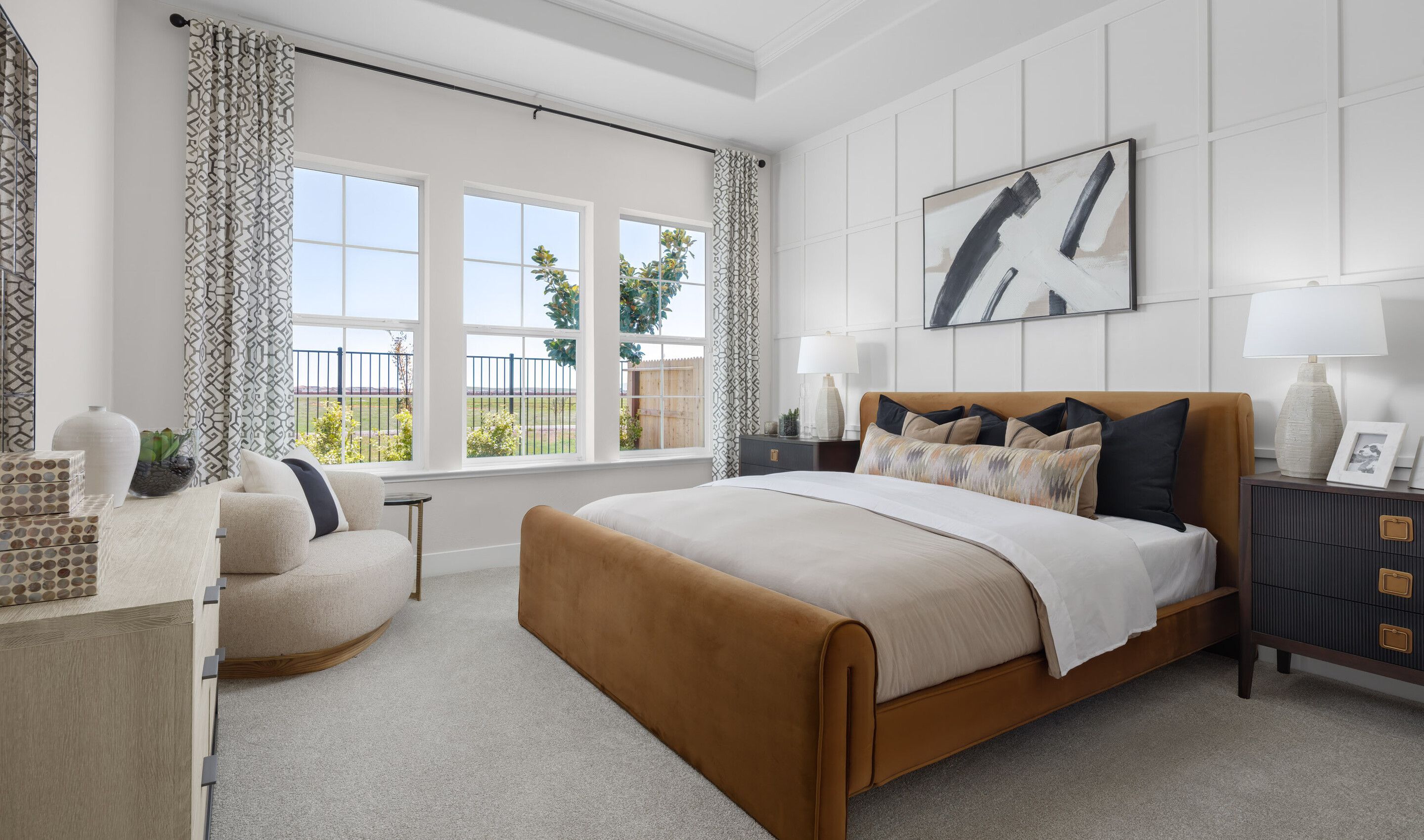 Primary suite with decorative feature wall