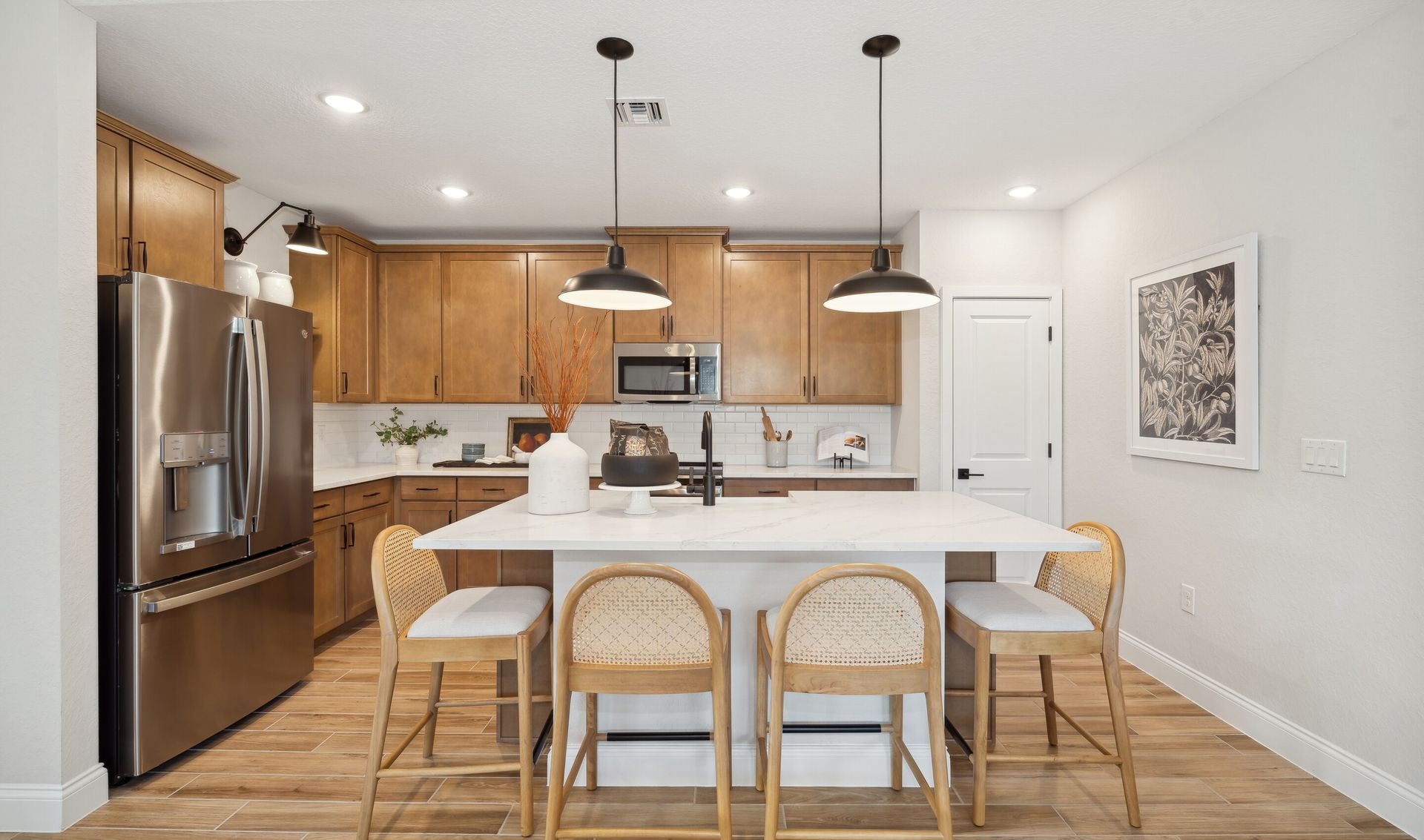 Kitchen with pendant lighting over center island