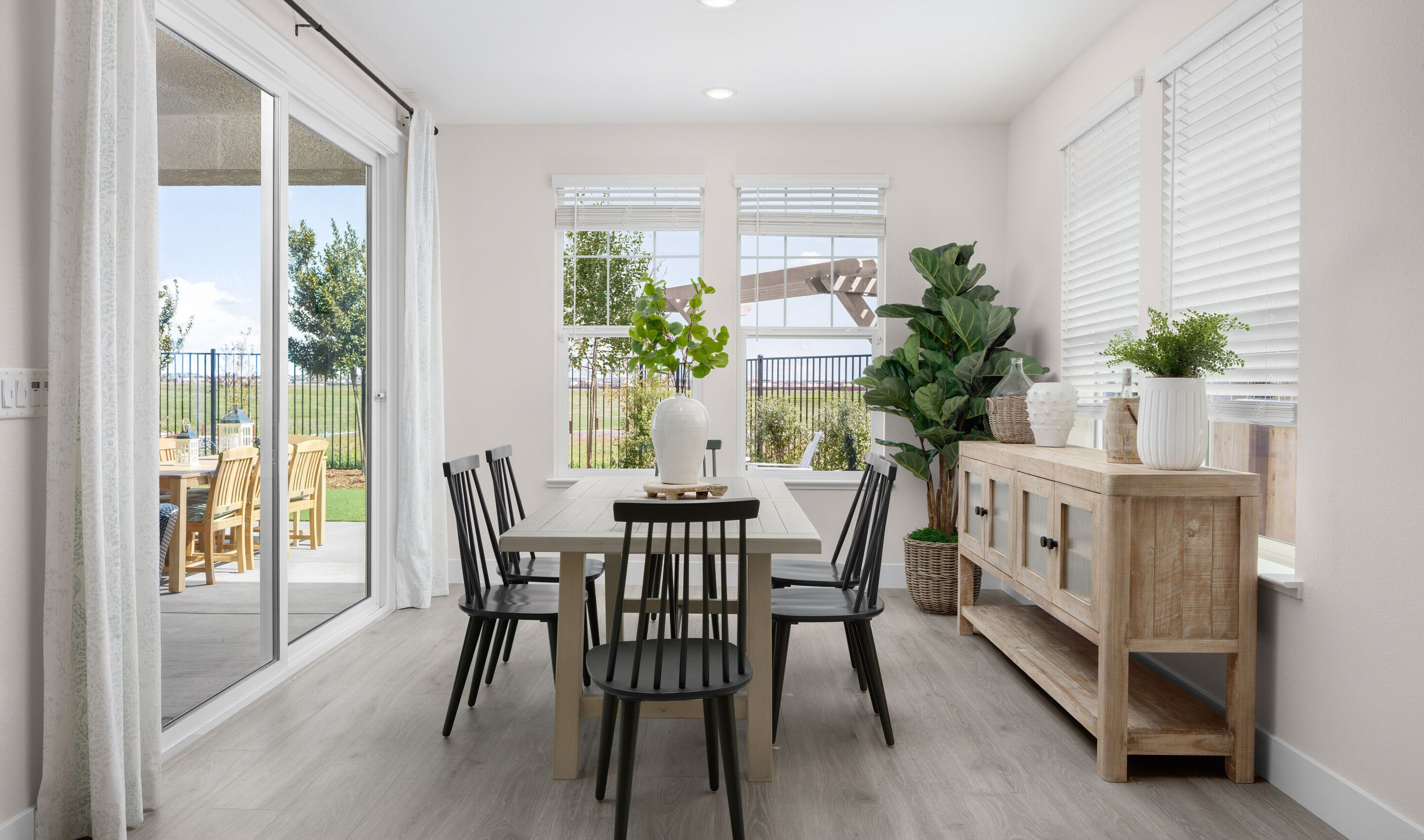 Dining area with sliding door to the covered patio