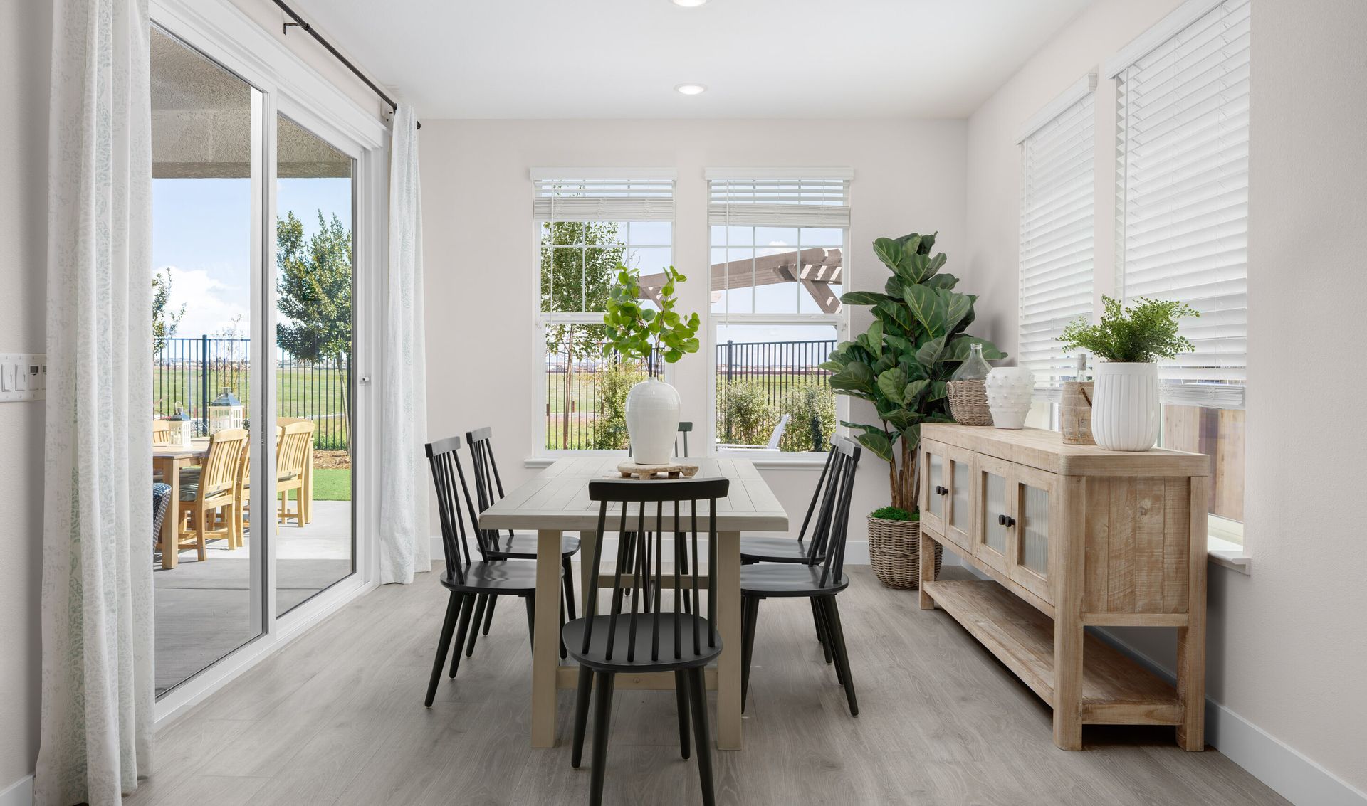 Dining area with sliding door to the covered patio