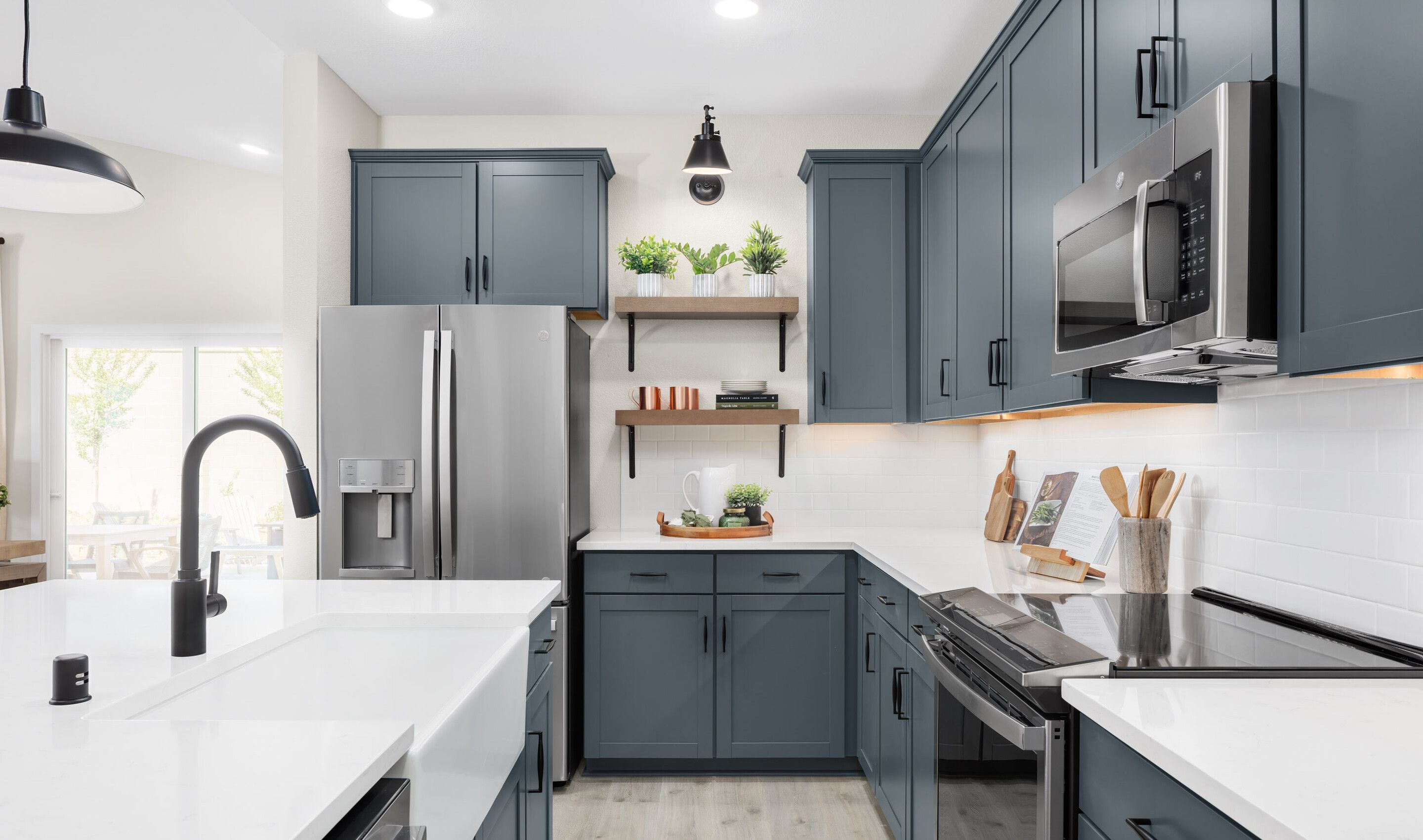 Kitchen with stylish floating shelves