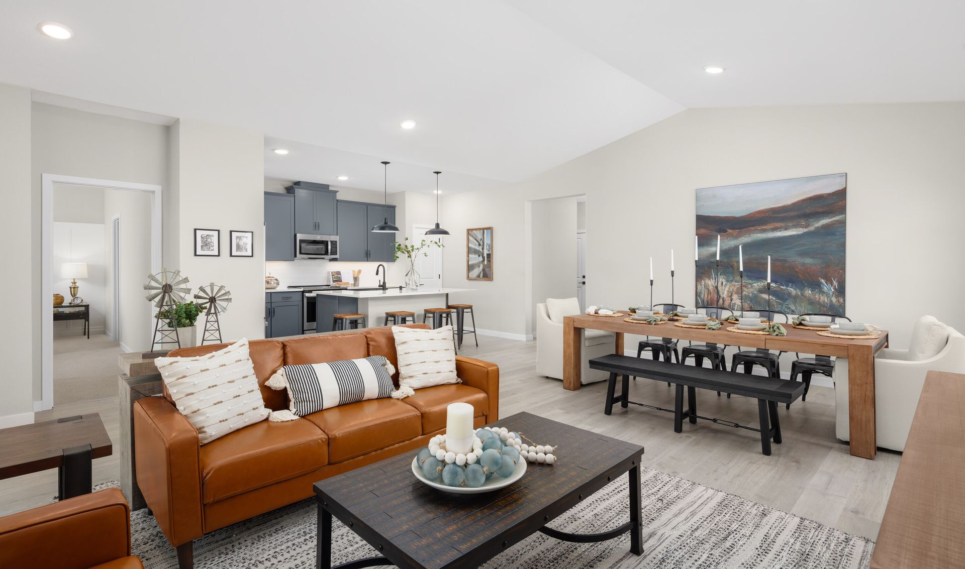 Main living areas united under vaulted ceiling