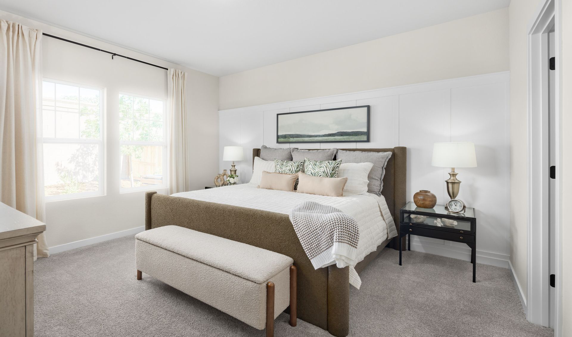 Primary suite with decorative feature wall