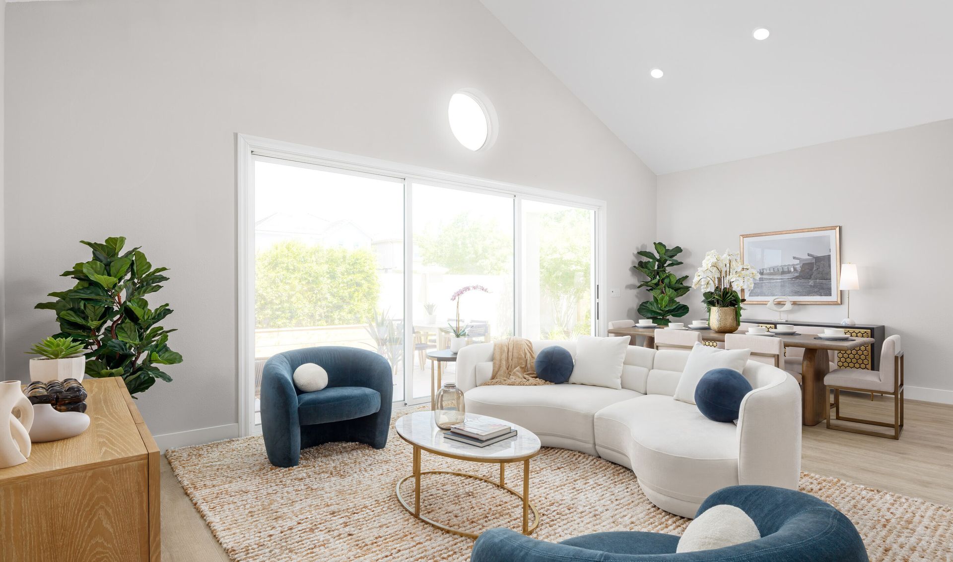 Vaulted ceiling in great room with 15' multi-slide door