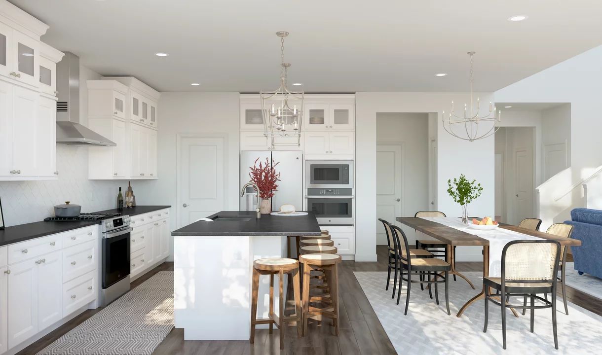 Kitchen with island, pendant lighting and glass upper cabinets