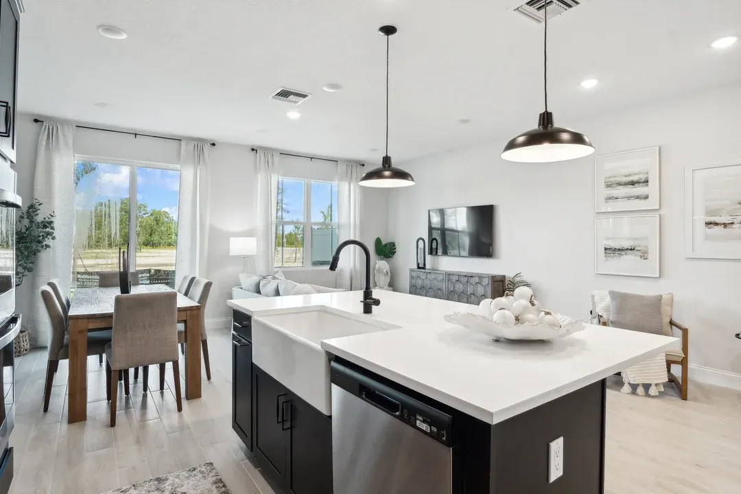 Kitchen with white apron sink