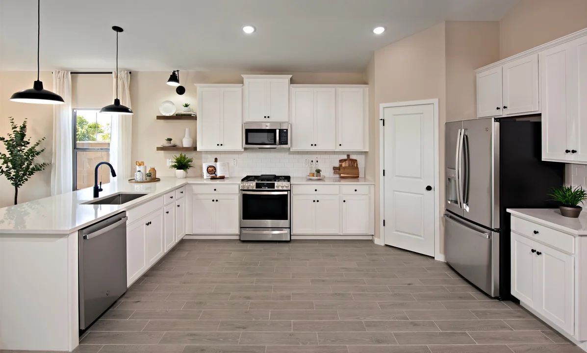 Kitchen with peninsula island and pendant lighting