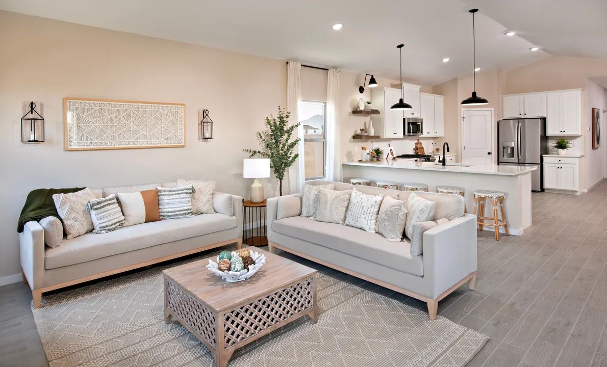 Great room with vaulted ceiling and luxurious tile flooring