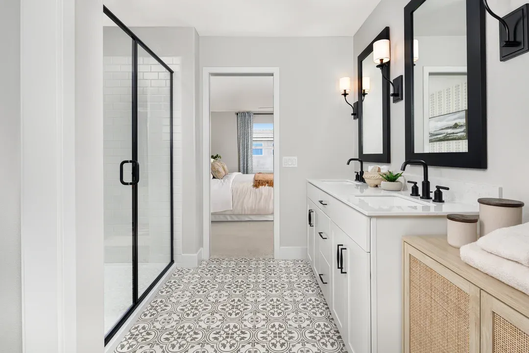 Primary bath with glass shower enclosure