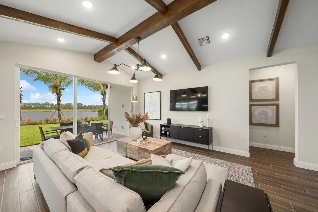 Great room with stained ceiling beams