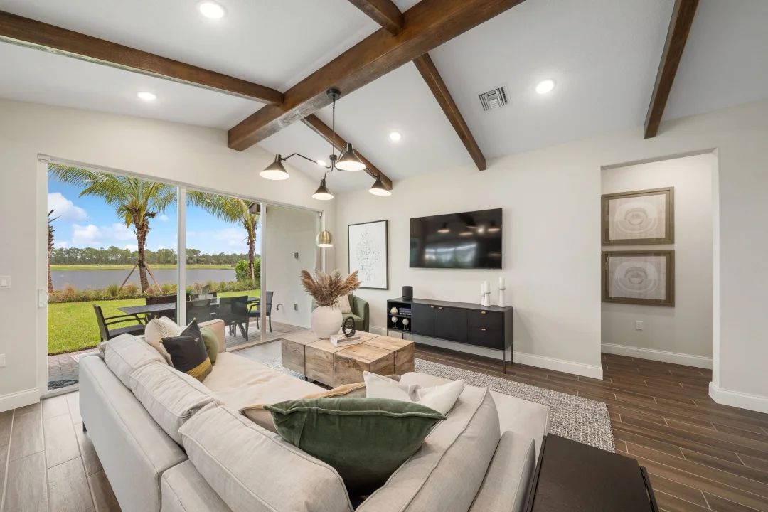 Great room with stained ceiling beams