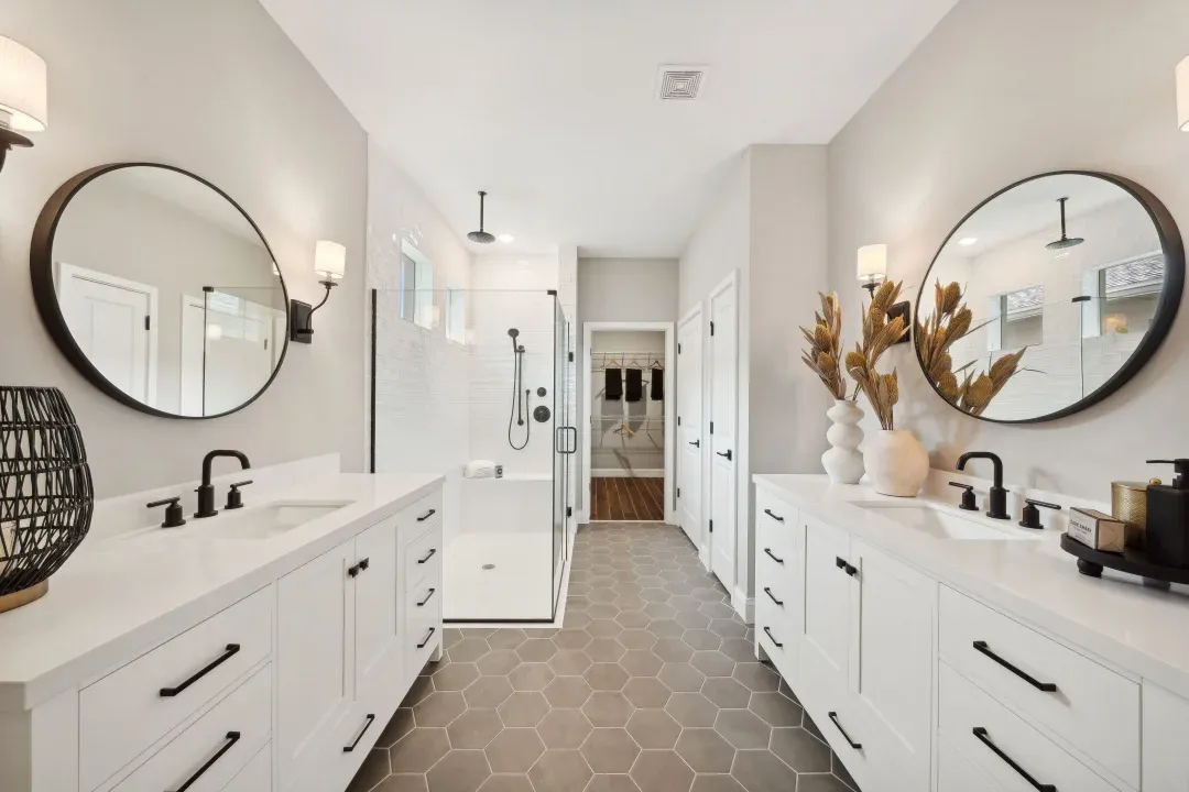 Primary bath with freestanding vanities