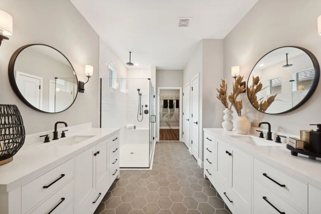 Primary bath with freestanding vanities