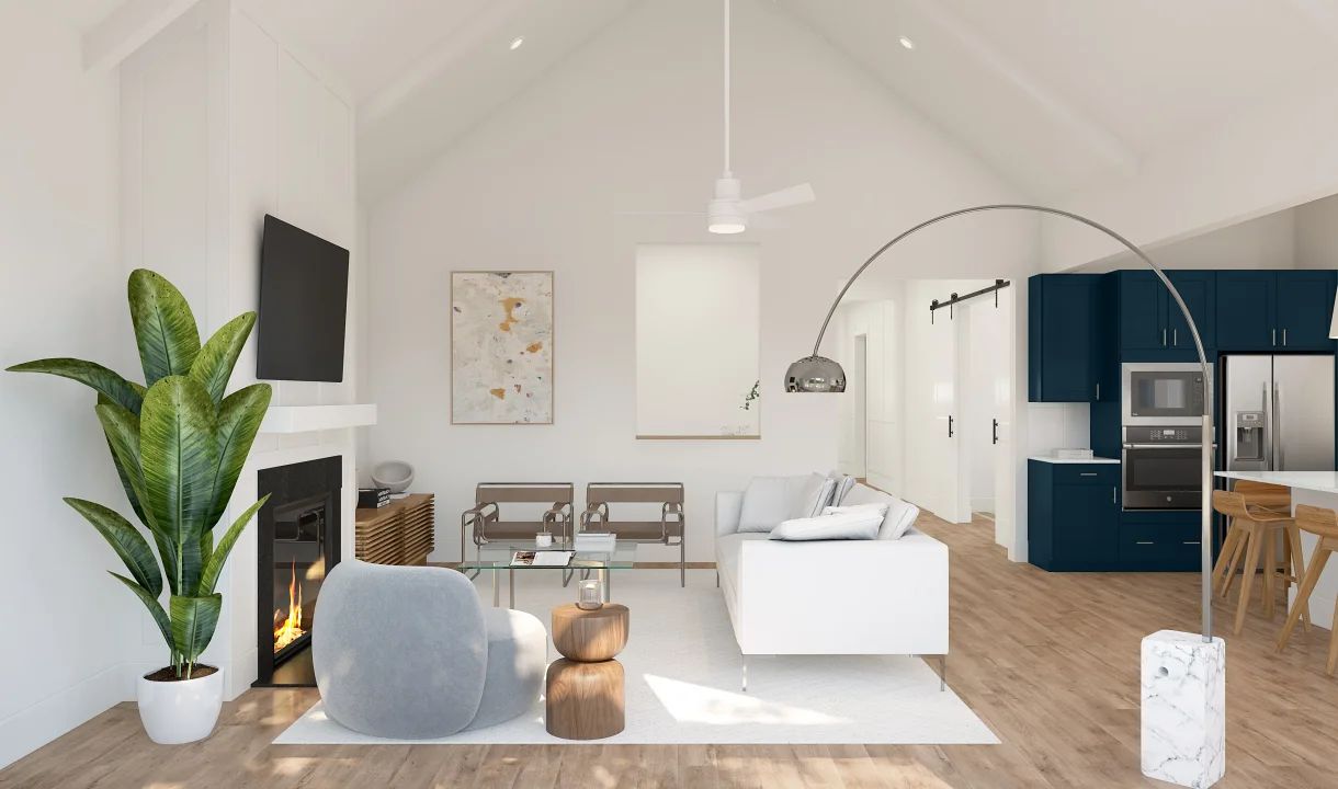 Great room with vaulted ceiling and white-stained ceiling beams