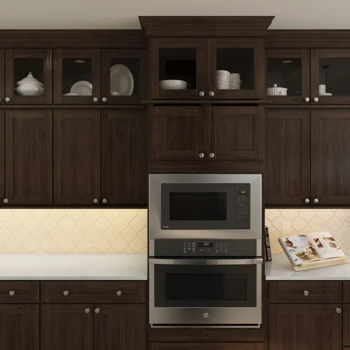 Kitchen with tile backsplash and glass upper cabinets