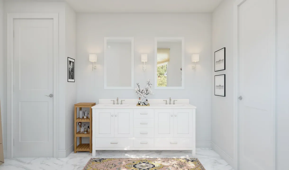 Primary bath with dual sinks and white-framed mirrors