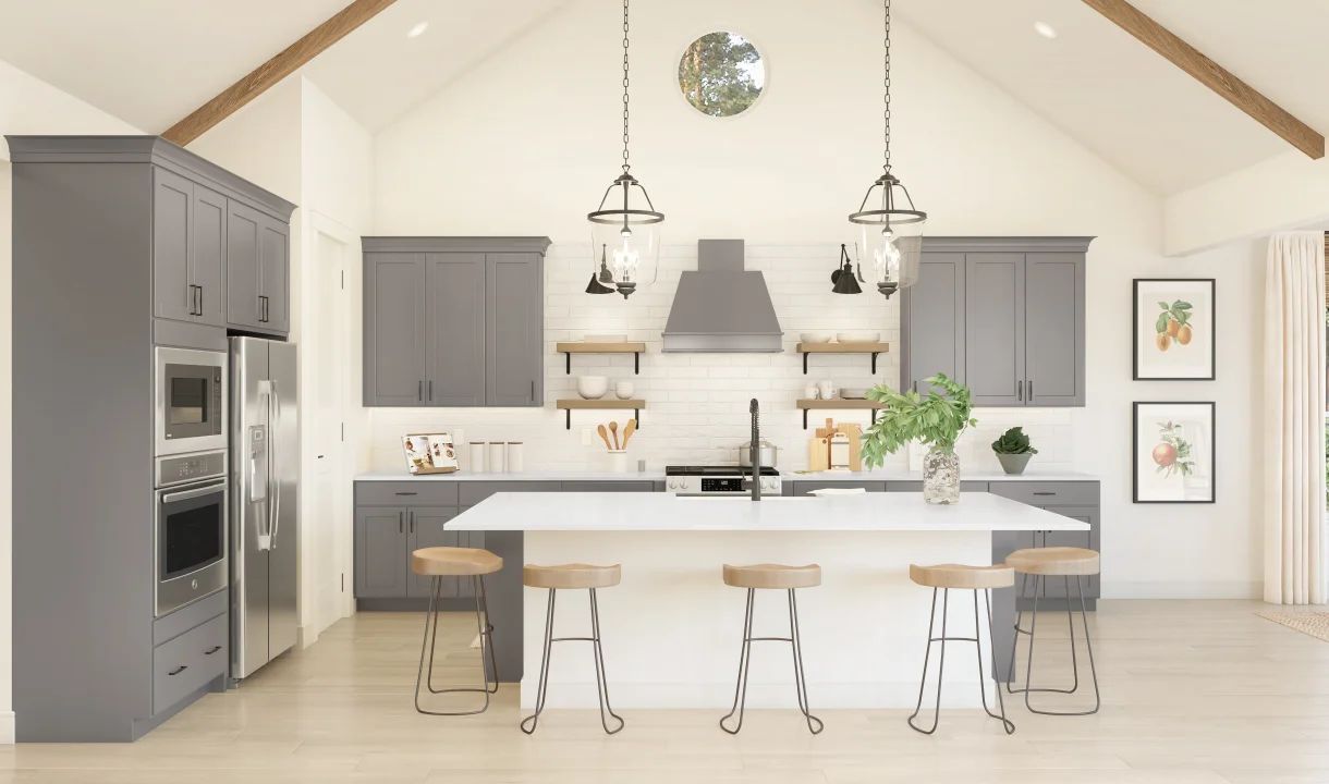Kitchen with pendant lights and vaulted ceiling
