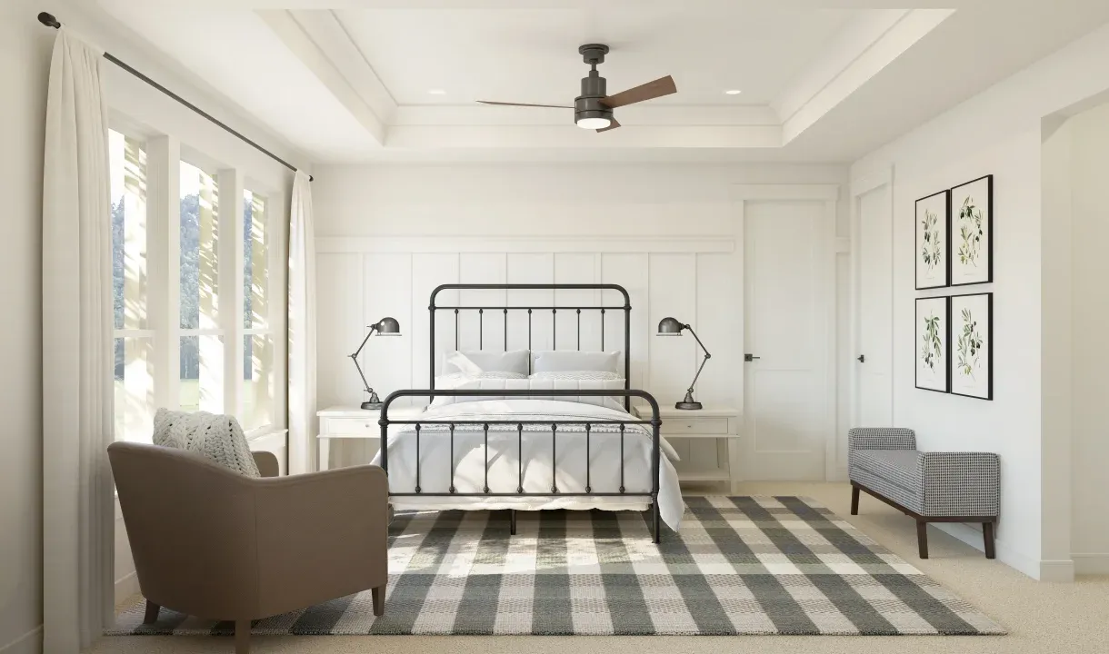 Primary suite with crown moulding and feature wall