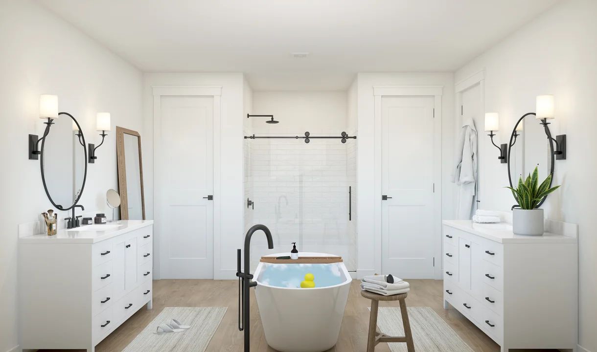 Primary bath with dual freestanding vanities