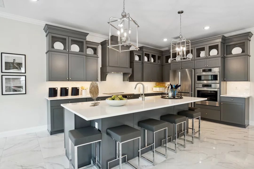 Kitchen with pendant lighting and glass upper cabinets