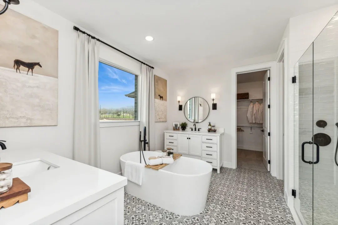 Primary bath with vessel tub and matte black fixtures