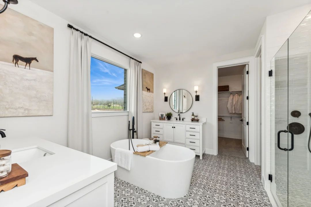 Primary bath with vessel tub and matte black fixtures