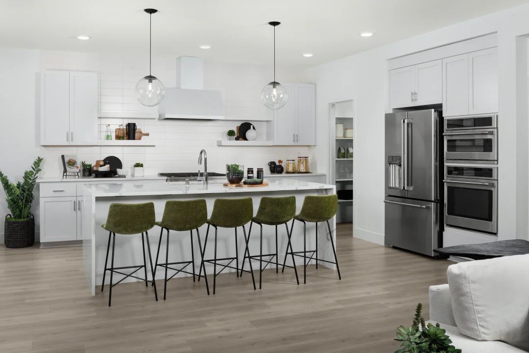 Kitchen with floating shelves and pendant lighting