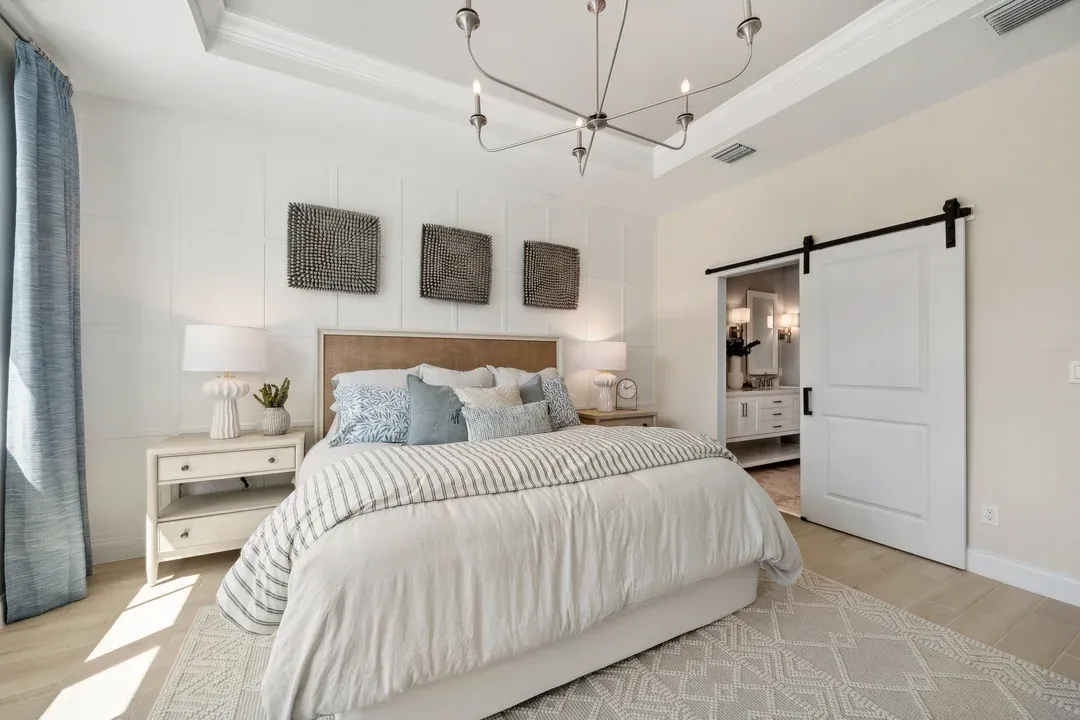 Primary suite with decorative feature wall