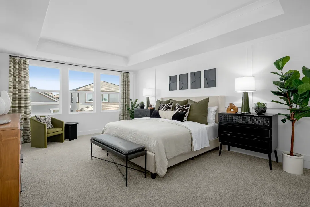 Primary suite with decorative feature wall