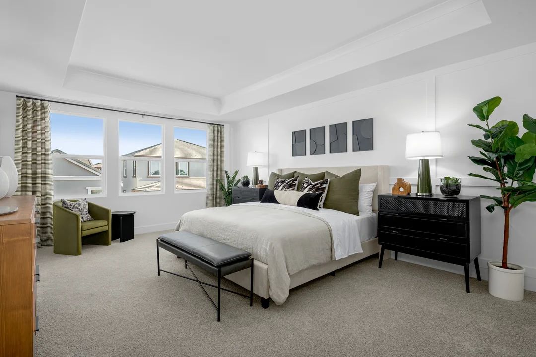 Primary suite with decorative feature wall