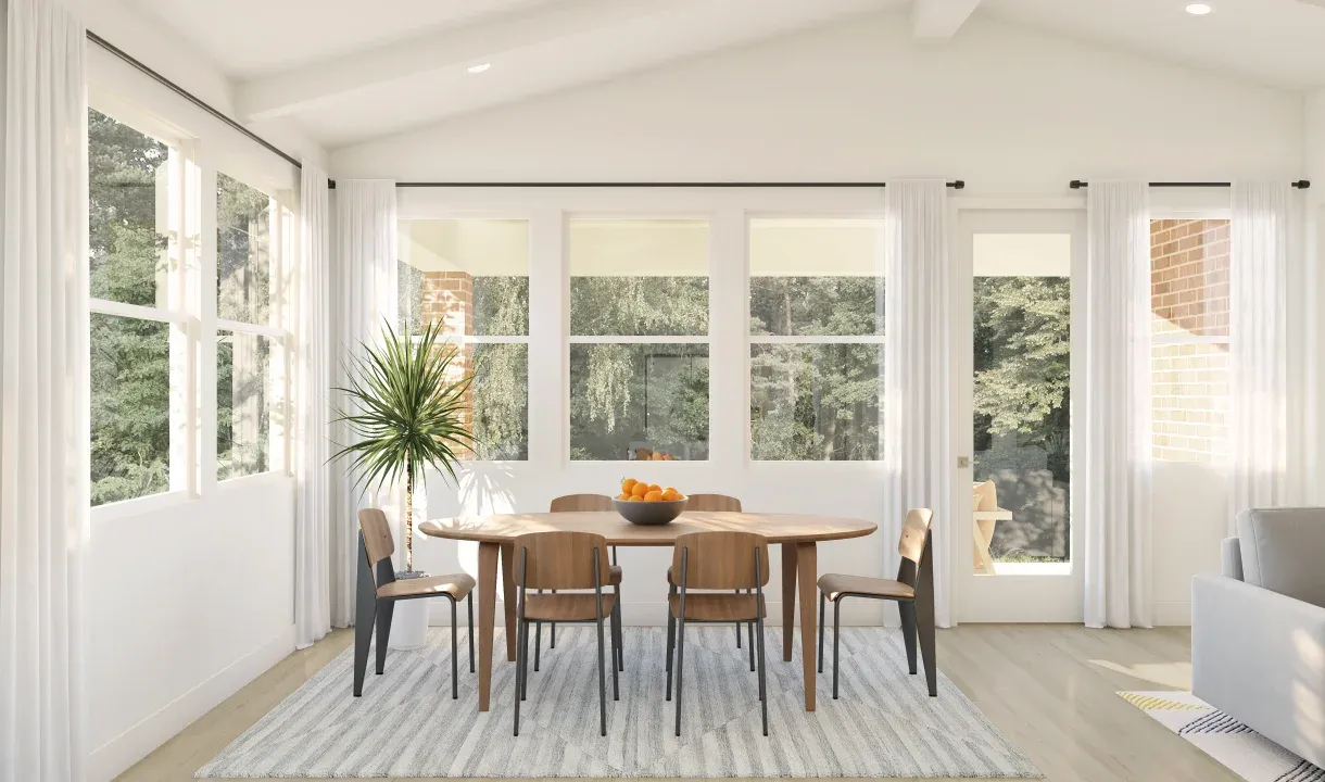 Dining area with vaulted ceiling and white beams