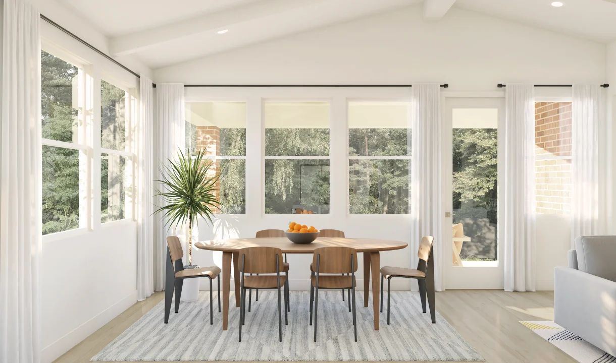 Dining area with vaulted ceiling and white beams