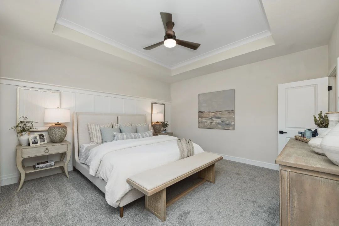 Primary suite with decorative feature wall