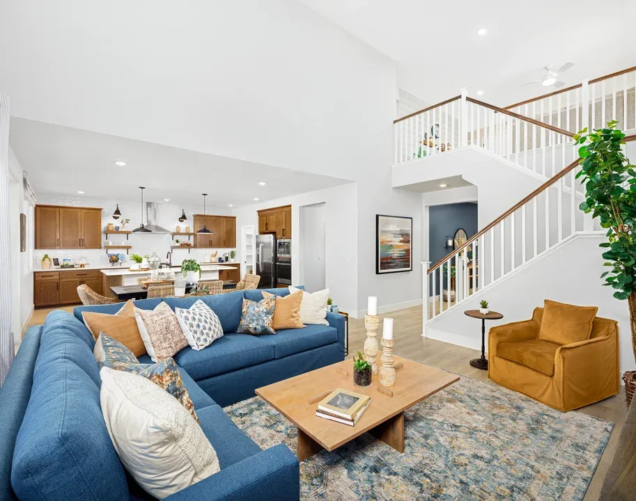 Two-story great room with luxurious wood floor