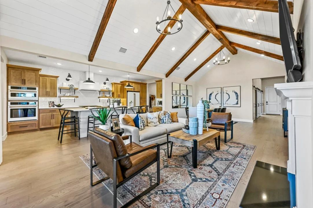 Great room with vaulted ceiling and stained ceiling beams
