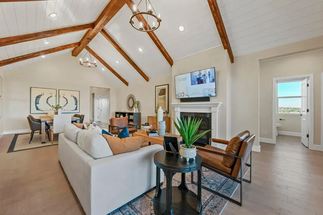 Great room with stained ceiling beams